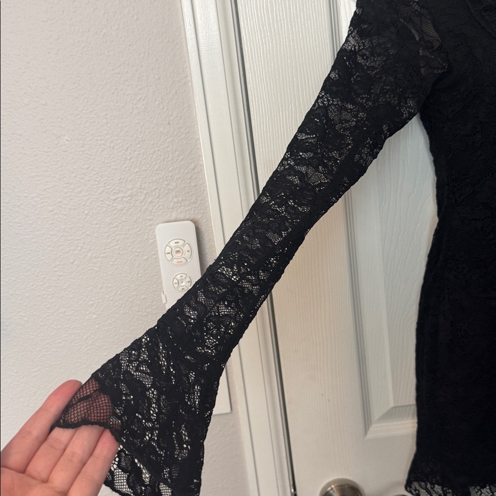 Princess Polly plunging neck line black lace mini dress. - Picture 6 of 7